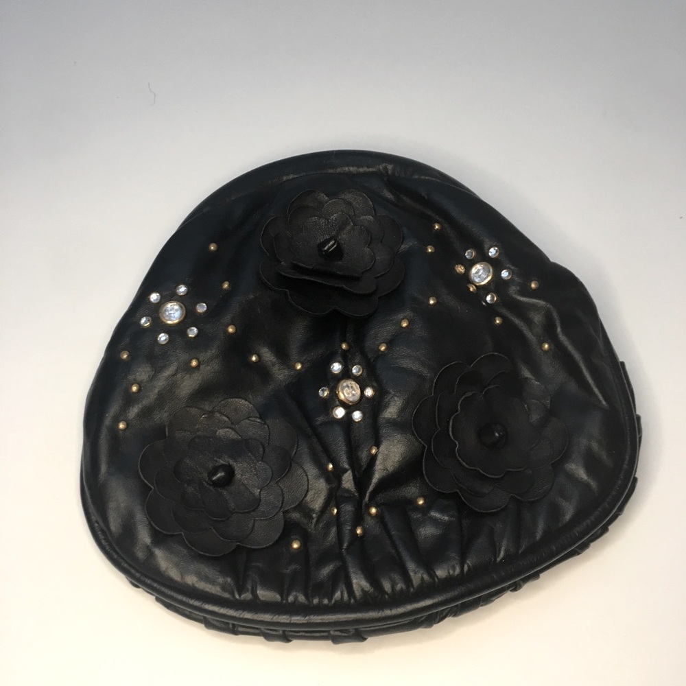 Vintage,black leather clutch with leather flower-jewelled details.